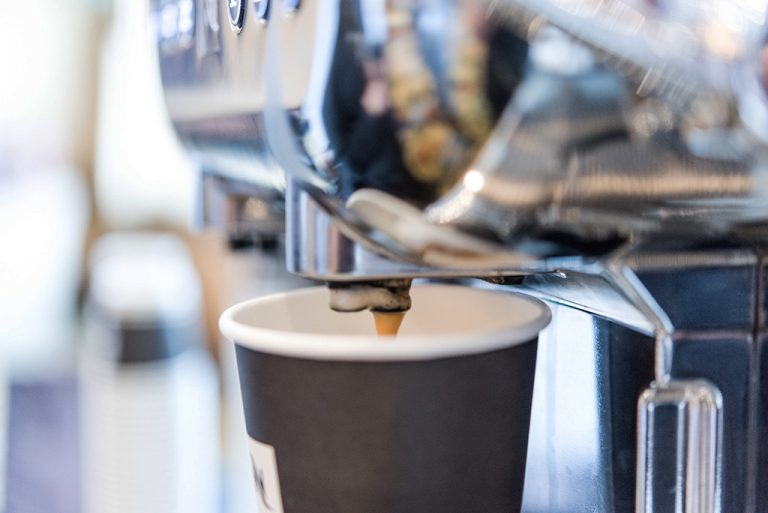 coffee machine pouring coffee