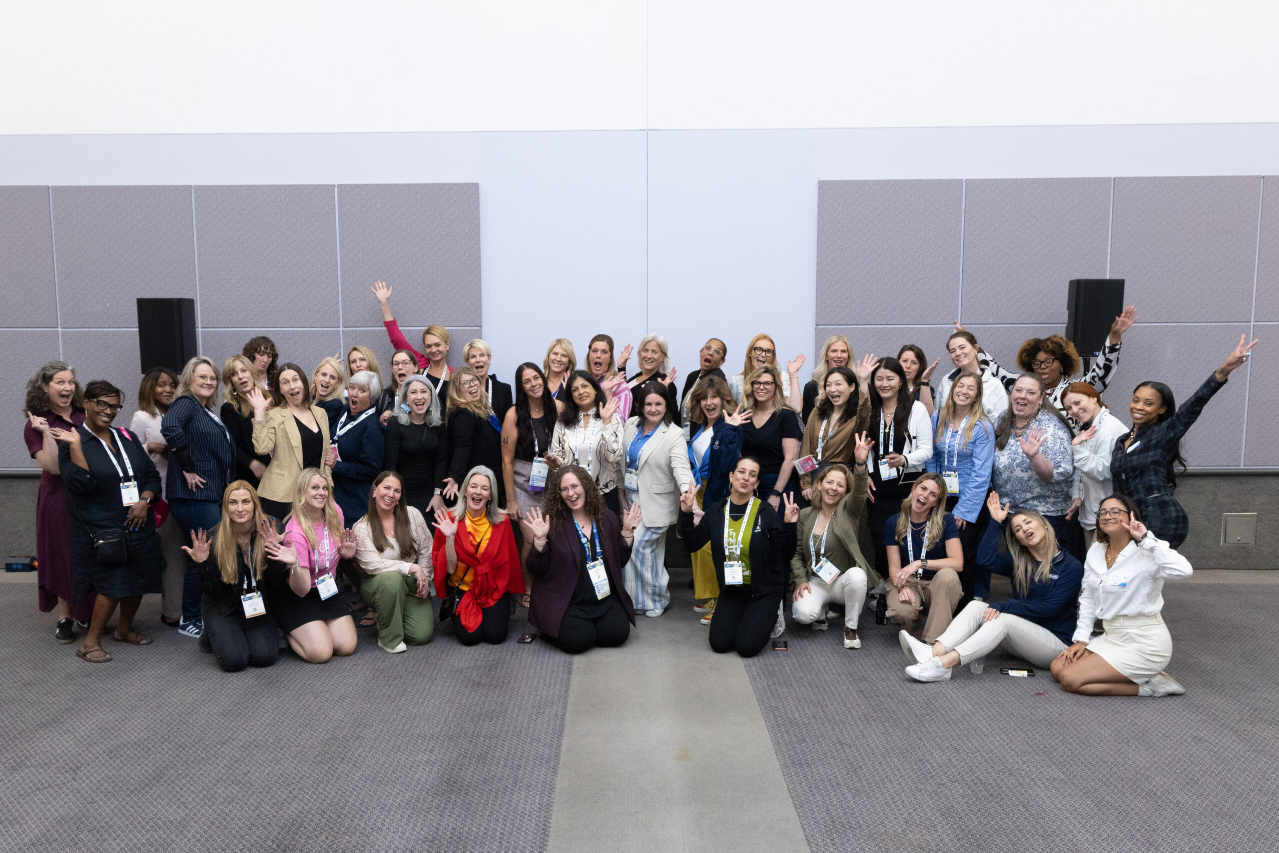 a group of women pose for a photo