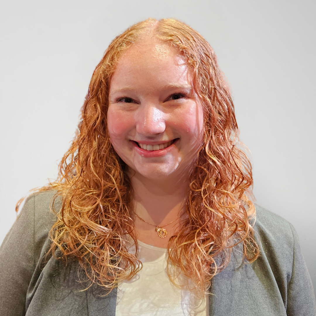 headshot of smiling female staff, Anna Livingstone