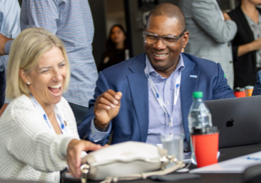 Two NAMA members in conversation