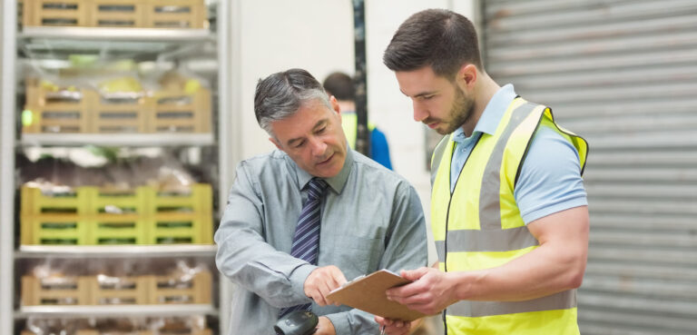 Micromarket warehouse manager speaking to coworker | NAMA Convenience Services | Tom Stuber column